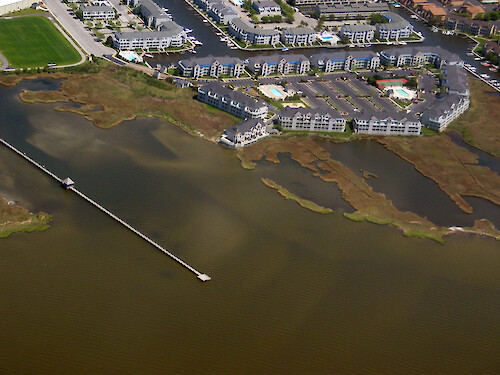 Canal estates in Ocean City border eroding wetlands along the Isle of Wight Bay.