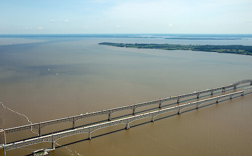 Sediment-laden plumes of water around the Chesapeake Bay Bridge following the recent flooding and extensive rains of June-July 2006.