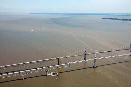 Sediment-laden plumes of water around the Chesapeake Bay Bridge following the recent flooding and extensive rains of June-July 2006.