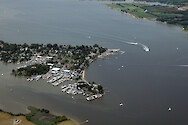 The town of Oxford, Maryland. Visible are multiple sediment-laden plumes of water following the heavy rains of June and July 2006