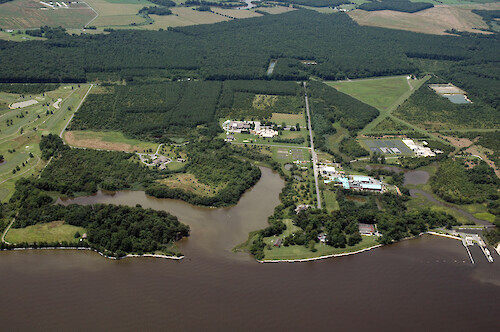 Aerial view of the Horn Point Laboratory and Center Administration of the University of Maryland Center for Environmental Science. Sediment plumes after the heavy rains of June and July 2006 are also visible around the boat basin.