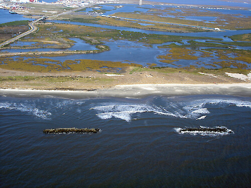 Aerial photo of coastal protection barriers along barrier islands in coastal Louisiana