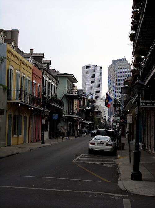 The French Quarter in the foreground with downtown New Orleans behind