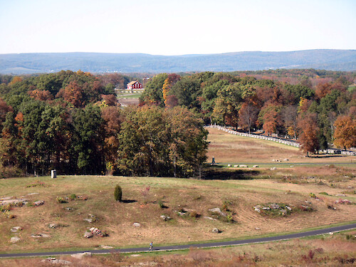 As Confederate forces tried to take Little Round Top from the Union forces, they crossed this field. The red barn in the distance was present during the battle. 