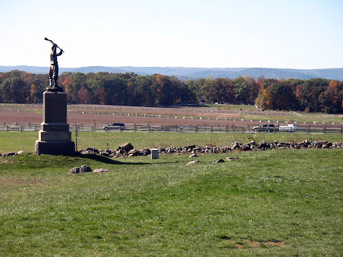 The spot where Pickett's soldiers attacked the Union line on the third day of the battle. The remnant of the stone wall built by Union soldiers can still be seen. 