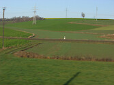Power lines criss-cross these agricultural fields in Bavaria, Germany