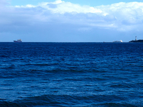 Ships passing Lonsdale lighthouse