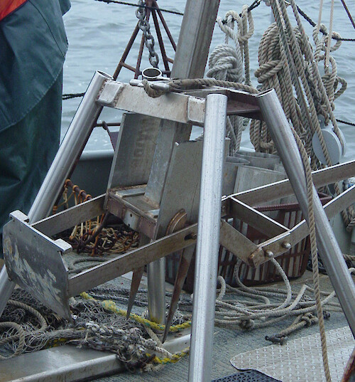 The grab sampler will collect sediment samples once the spring releases the jaws at the bottom of the Patuxent River.