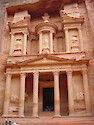 The highly defensible treasury hall at Petra, Jordan was carved into the soft rock. The double line of notches to either side of the main building held ladders for the carvers, who started from top. 