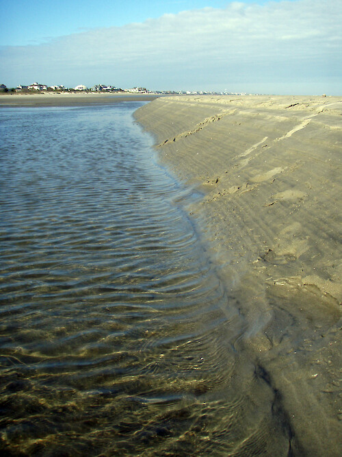 Overwash sections have cut deep into the beach