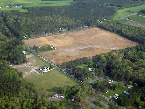 Field lies fallow southwest of Salisbury, Maryland