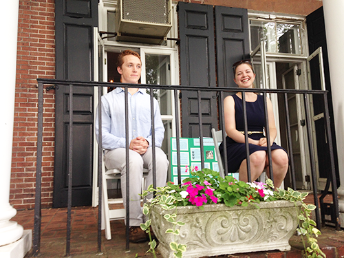 Dylan and Suzi pose as Admirals sitting on their front porch just after setting up for the incoming students. Credit: Judy O’Neil