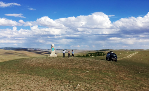 Monument at the site of the triple continental divide. Photo credit Bill Dennison