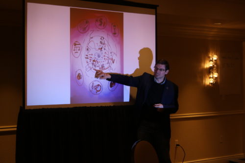 They then presented them to the entire group, clarifying any ambiguity in their sketches. Photo credit: Sky Swanson.