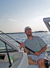 Heath Kelsey fishing on boat