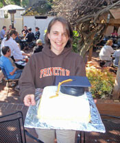 Jeni with graduation cake