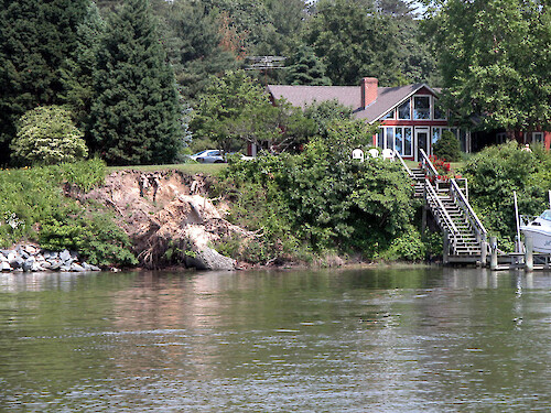 The combination of property owners removing riverfront vegetation and passing boat wakes, both commercial and recreational, can lead to bank erosion and the collapse of soil and trees into the waterways.