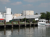 Historically and currently, Easton Point has industrial waterfront activities such as fuel sales, delivery and storage, and gravel depots for asphalt production. A waterman's coop is also located here for the marketing of Maryland blue crabs.
May 2005, Tred Avon River, Easton, MD