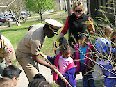 Navy volunteers from Naval Amphibious Base, Little Creek, VA participate in tree plantings with local school children as part of continuing education and outreach.