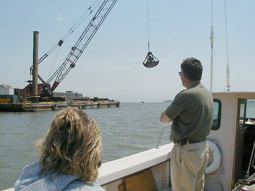 Virginia Marine Resources Commission and Langley Air Force Personnel oversee construction of an oyster reef in the Back River in Hampton, VA.