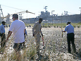 Navy enlisted and civilian volunteers plant 9000 plants at a former Superfund site returning the area to wetlands.