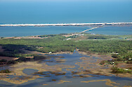 Eroding marshes in Newport Bay, with Sinepuxent Bay and Assateague Island in the background.