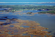 Ditches, eroding marshes and a golf course in Newport Bay. In the background are Sinepuxent Bay and Assateague Island.