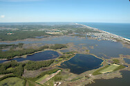 Aerial view of the Assawoman Wildlife Area in Little Assawoman Bay. Little Bay is in the background.