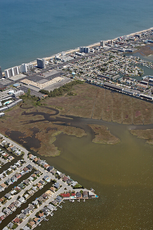 Remnant marshes and developments along Fenwick Island in Assawoman Bay