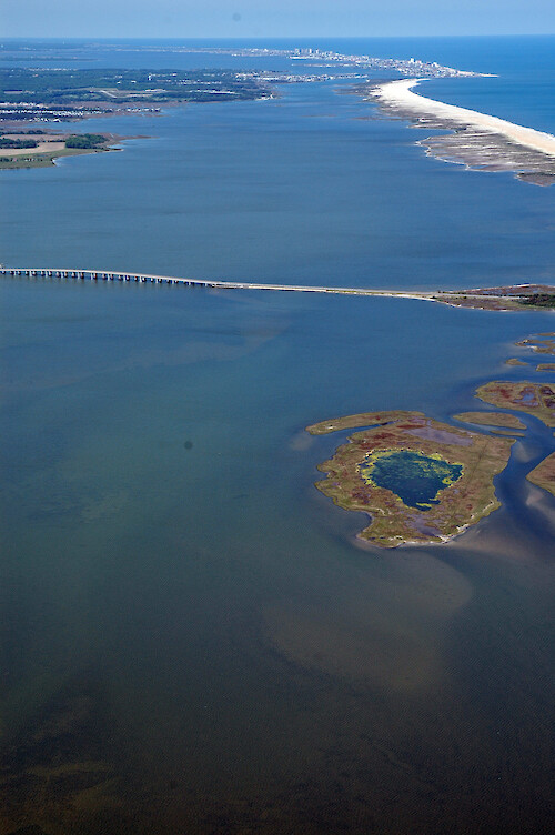 Looking north along Sinepuxent Bay. The Route 611 bridge to Assateague Island is visible.