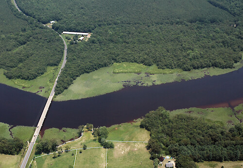 Dark coffee-colored water in Marshyhope Creek, a tributary of the Nanticoke River, after the excessive rains of June 2006