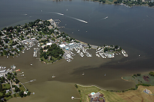 The town of Oxford, Maryland. Visible are multiple sediment-laden plumes of water following the heavy rains of June and July 2006