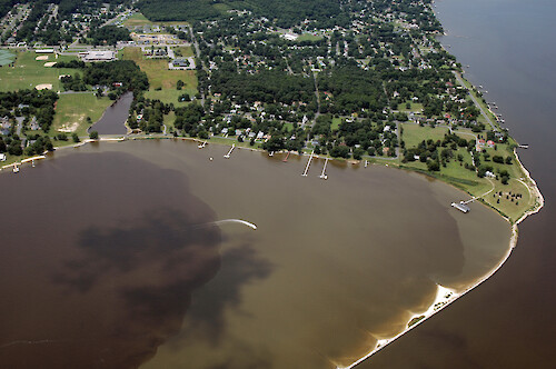 Aerial view of Hambrooks Bay, Cambridge. Multiple sediment-laden plumes of water are visible, a result of the heavy rains of June and July 2006