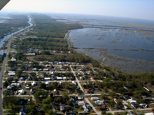 Flood protection barrier near bayou town in coastal Louisiana