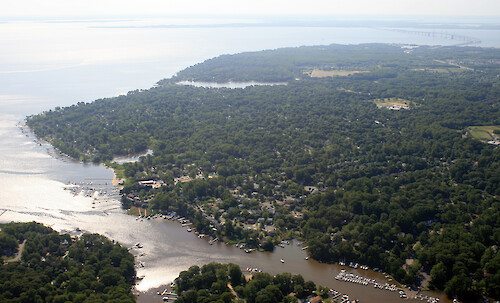 Deep Creek and Cape St Claire on the Magothy River. Chesapeake Bay, Kent Island, and the Bay Bridge are visible in the background.