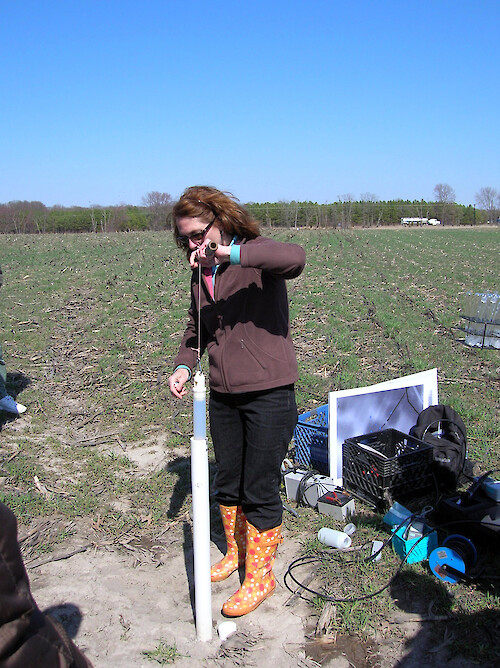 Demonstrating how water quality measurements are taken in an agricultural field in Maryland.