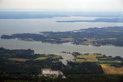 Looking southwest over the East River (foreground), North River (middle), and Ware River (background). Whites Neck is in the middle and Ware Neck is in the background