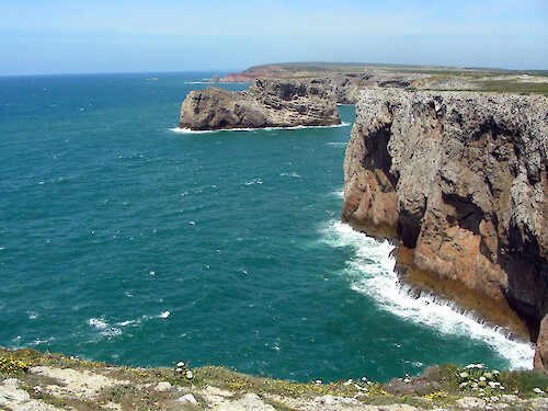 Heavy surf collides with the cliffs near Cape Saint Vincent in SW Portugal - most westerly point in Europe.