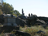 People view the monuments on Little Round Top. This was the location of fierce fighting on the second day of the battle. 