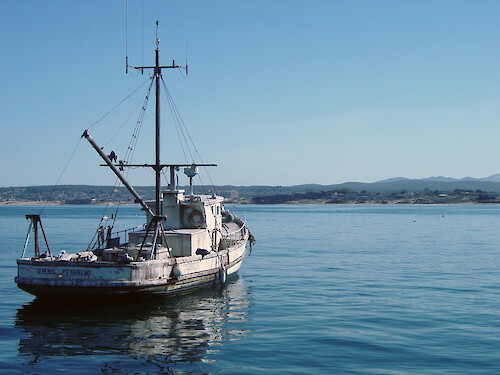 The fishing boat 'General Pershing' moored off Monterey, CA
