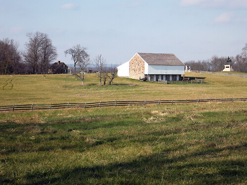 From NPS brochure: The Battle of Gettysburg began about 8 am to the west beyond McPherson barn as Union cavalry confronted Confederate infrantry advancing east along Chambersburg Pike. Heavy fighting spread north and south along this ridgeline as additional forces from both sides arrived.