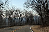 The tree-lined Skyline Drive wends through Shenandoah National Park along mountain ridges, providing opportunities to see expansive vistas as well as hardwood forests.