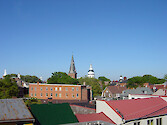 Rooftops of Annapolis. The capitol building at State Circle and the church at Church Circle can be seein the center background.