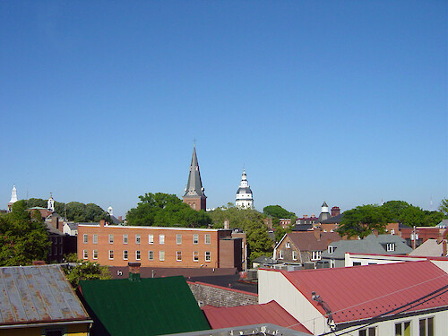 Rooftops of Annapolis. The capitol building at State Circle and the church at Church Circle can be seein the center background.