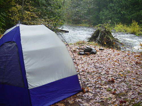 Camping along a river at the base of Mt. Hood National Forest, Oregon. 