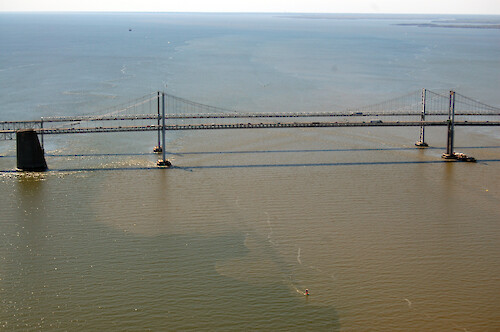 Chesapeake Bay Bridge and a large sediment plume.