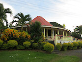 Fancy fale and gardens in Samoa, on the north-west coast of Upolu.