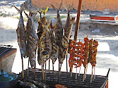 This beach at Los Ayala is very popular with Mexican tourists who come to enjoy Semana Santa week (Easter) at this Mexican resort town. Many vendors turn out and sell local produce and seafood such as these grilled shrimp and fish.