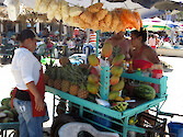 The coastal town of Los Ayala is very popular with Mexican visitors who come to enjoy a day at the beach. Vendors sell boat tours, merchandise, and food such as these fresh pineapples and mangos.