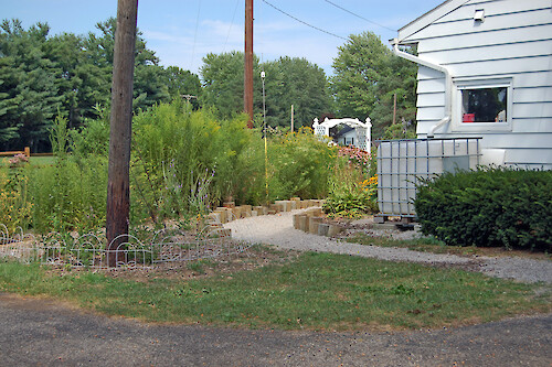 A rain garden and rain barrel at an environmental center near Old Woman Creek. Ohio.